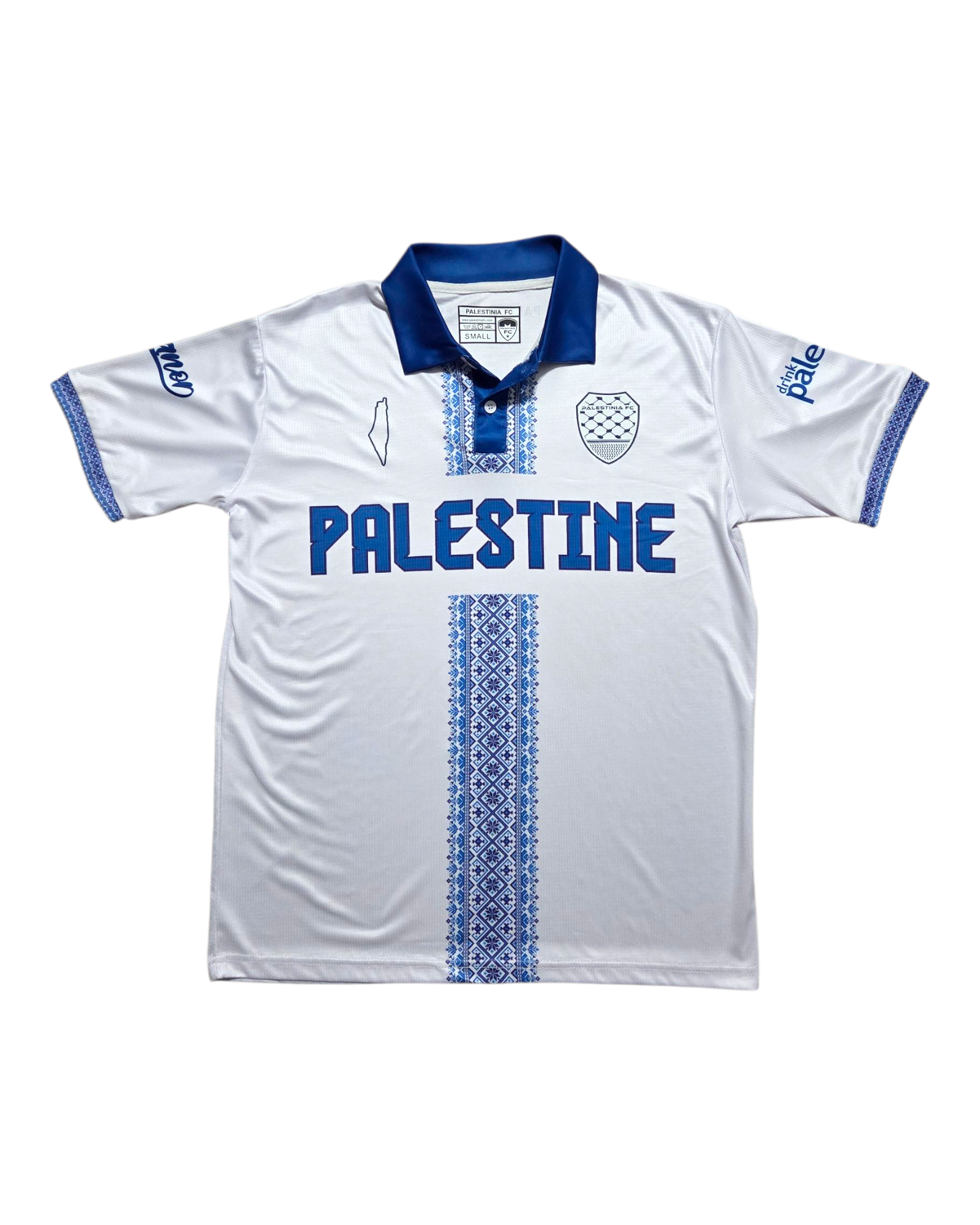 Front of white Palestine jersey featuring blue Tatreez embroidery-inspired design