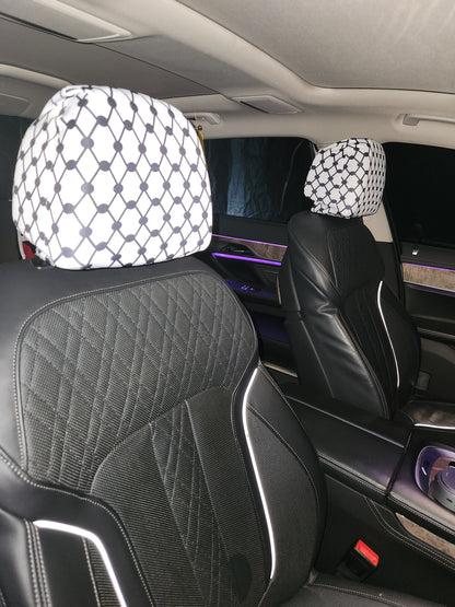 Palestinian Kufiya design car headrest covers on rear seats, white pattern over black leather