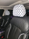 White Keffiyeh car headrest covers installed on black leather seats, Palestinian Kufiya design