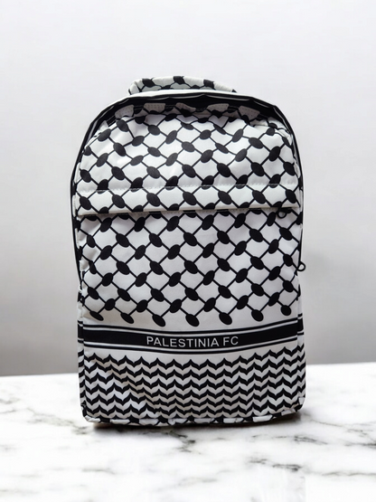 A backpack with a geometric pattern, predominantly in black and white, with 'PALESTINIA FC' branding on the lower part.