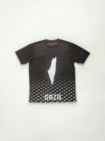 Back view of Kids Black Palestine jersey showing Gaza silhouette and Palestinia FC text across keffiyeh pattern
