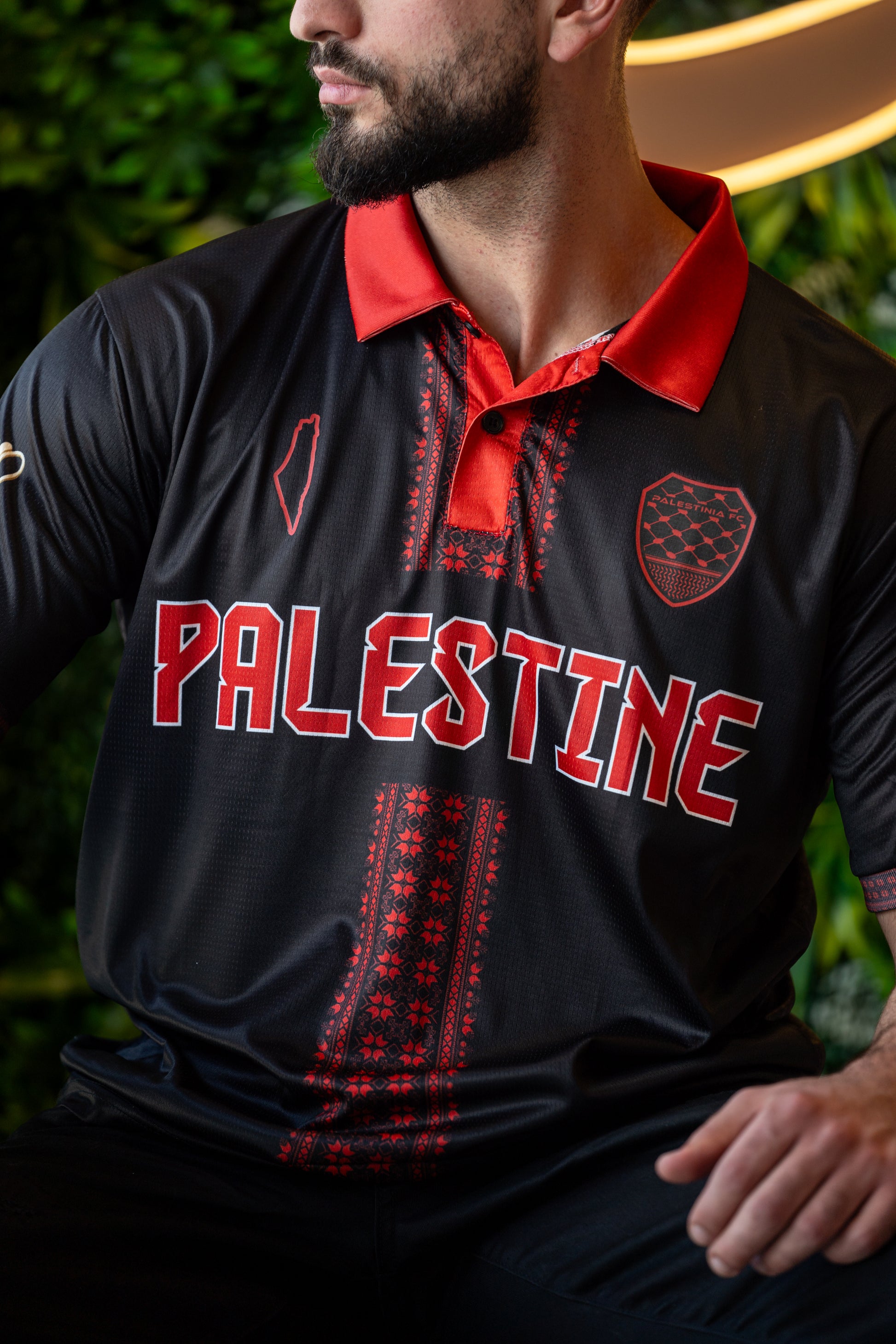 Model wearing Palestine Tatreez design jersey symbolizing culture and solidarity